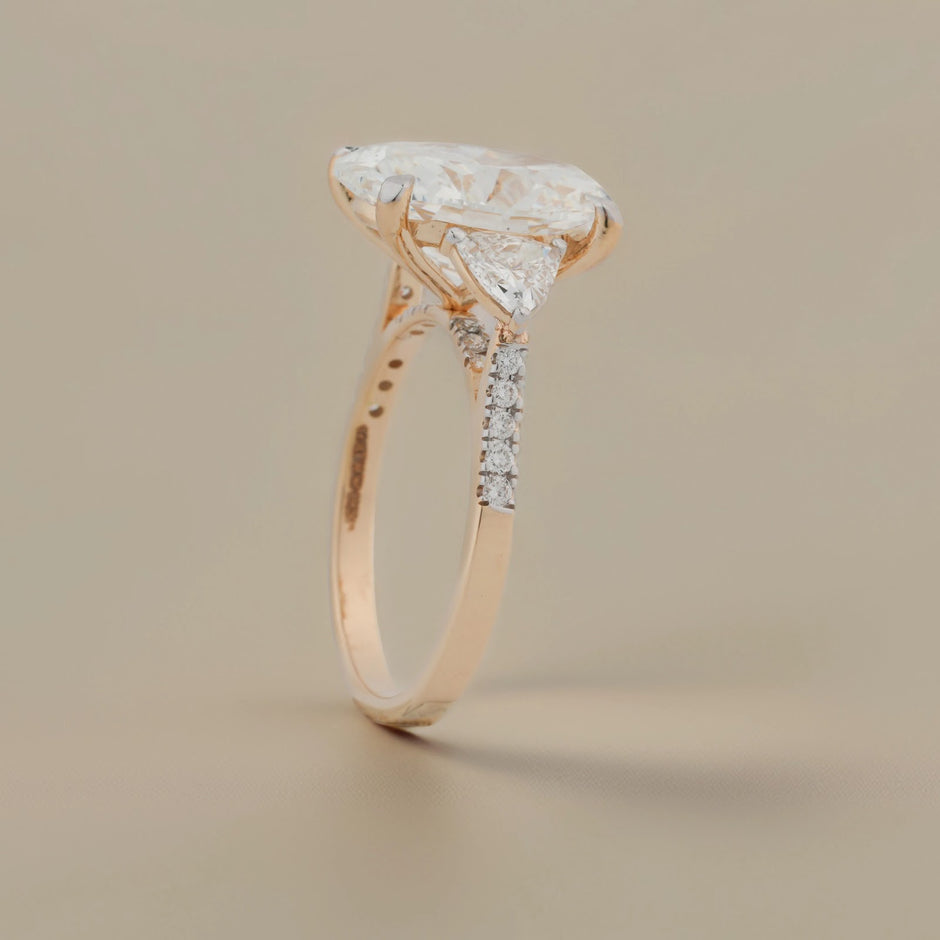 Evelisse Oval Pear-Side Three-Stone Ring — angled view