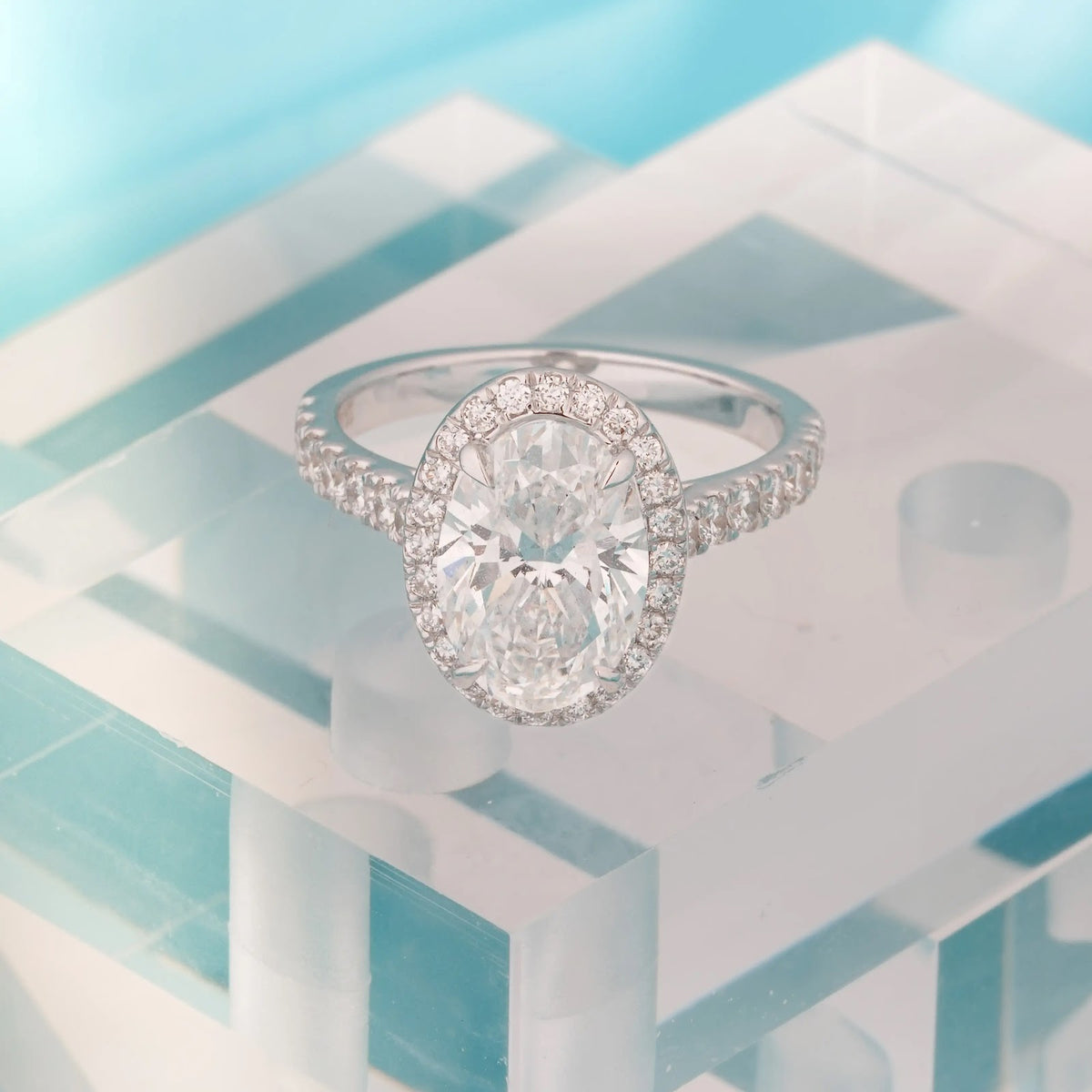 Liora Oval Halo Pavé Engagement Ring — angled view