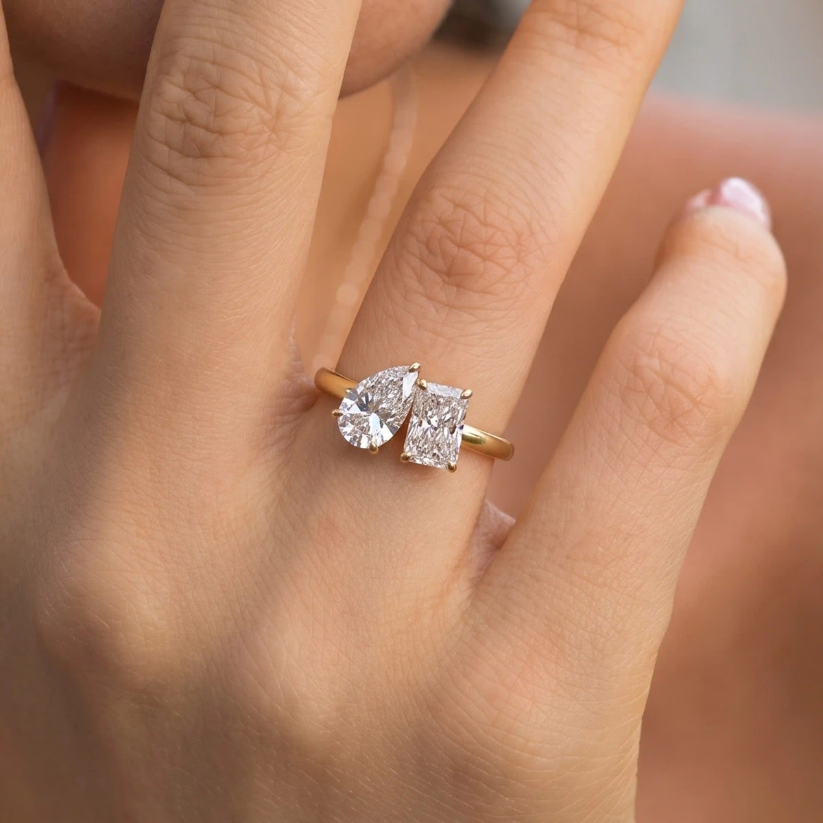 Duet Pear & Radiant Toi et Moi Ring — worn view