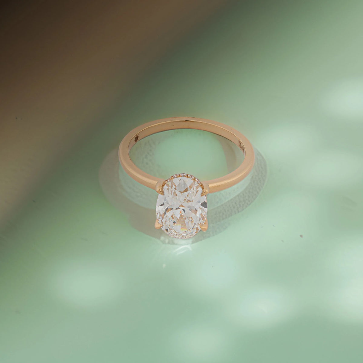 Alina Oval Basket Solitaire Ring — angled view