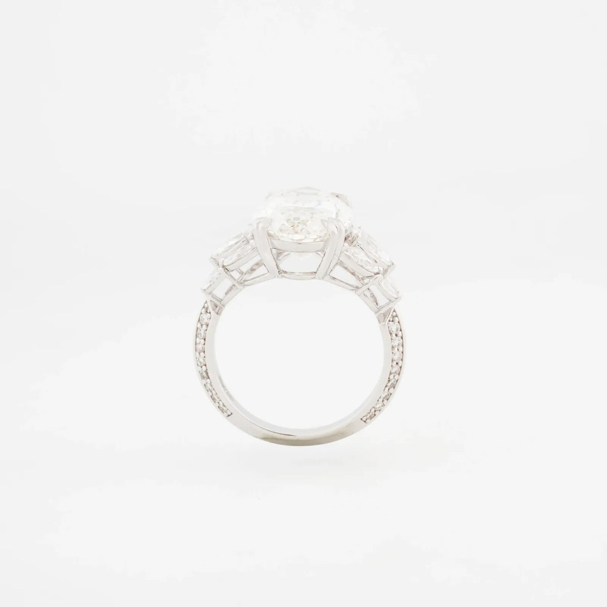 Serenade Pear Three-Stone Pavé Ring — profile view
