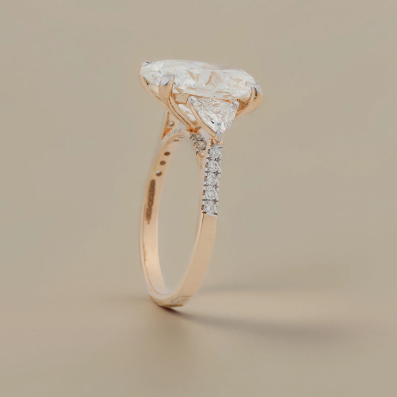 Evelisse Oval Pear-Side Three-Stone Ring — angled view