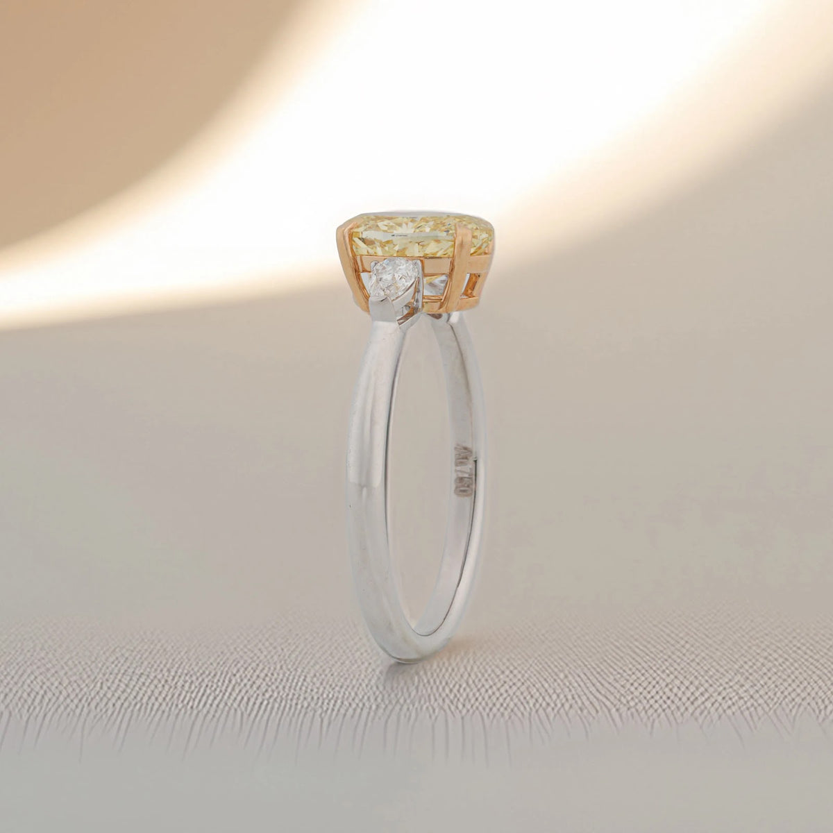 Solene Fancy Oval Three-Stone Ring — angled view