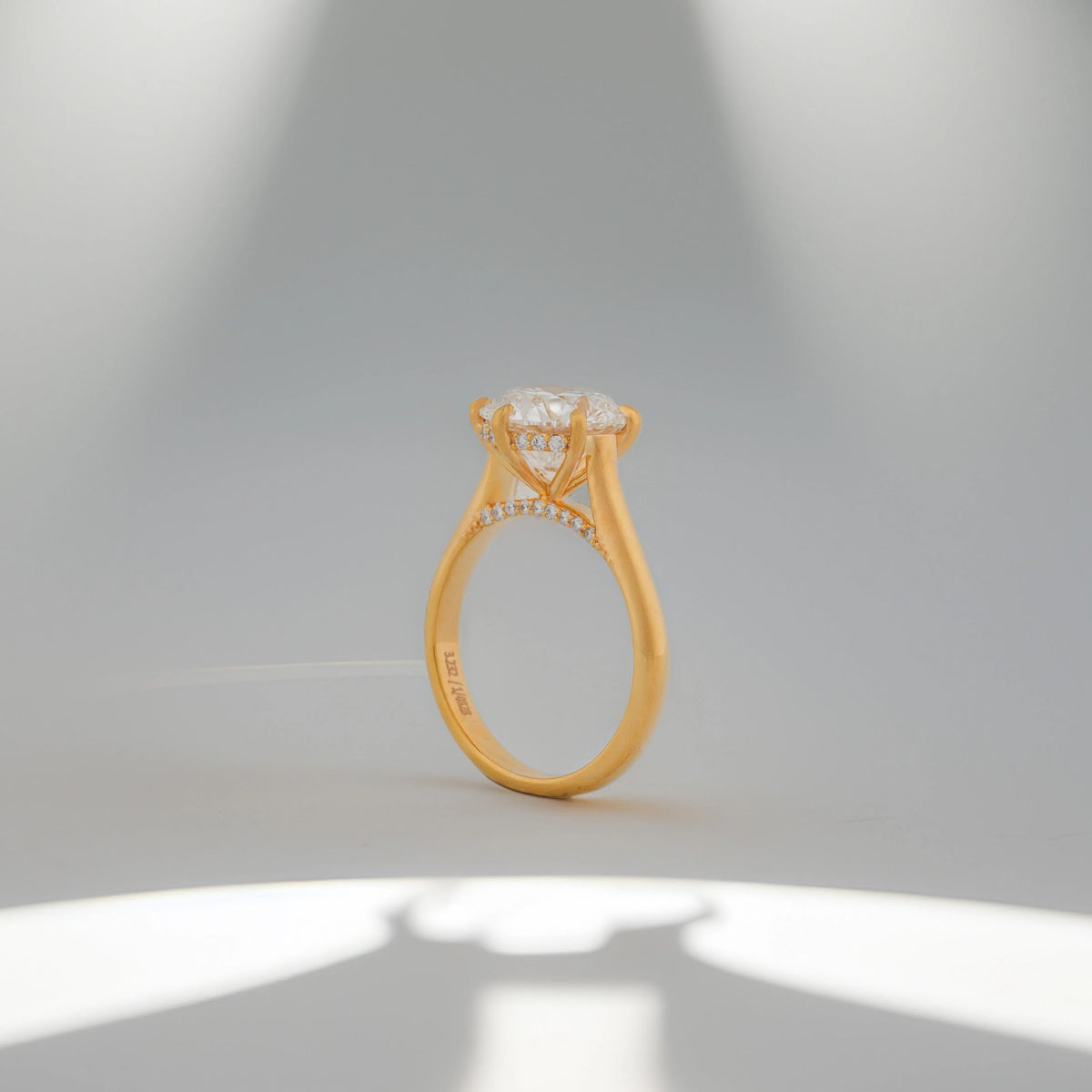 Neria Round Raised-Basket Solitaire Ring — profile view