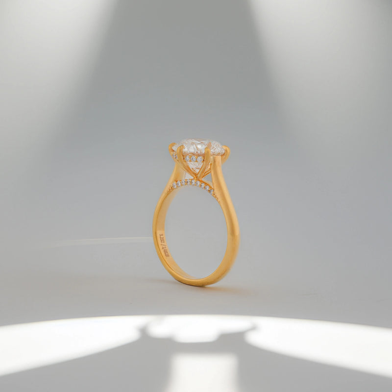 Neria Round Raised-Basket Solitaire Ring — profile view