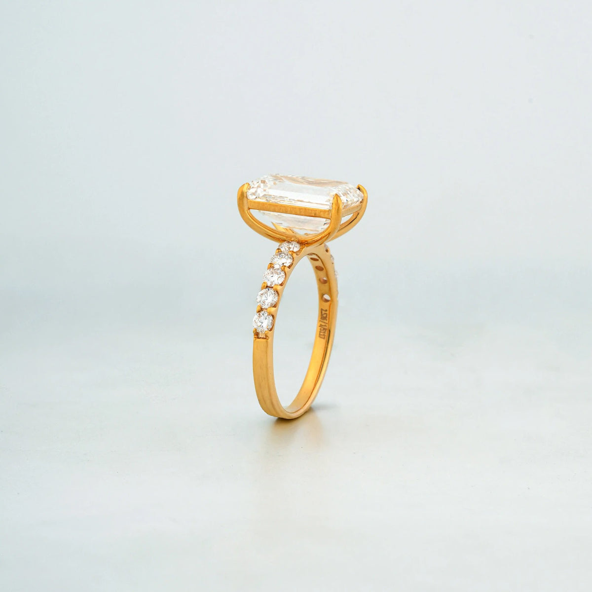 Arden Emerald-Cut Pavé Solitaire Ring — profile view