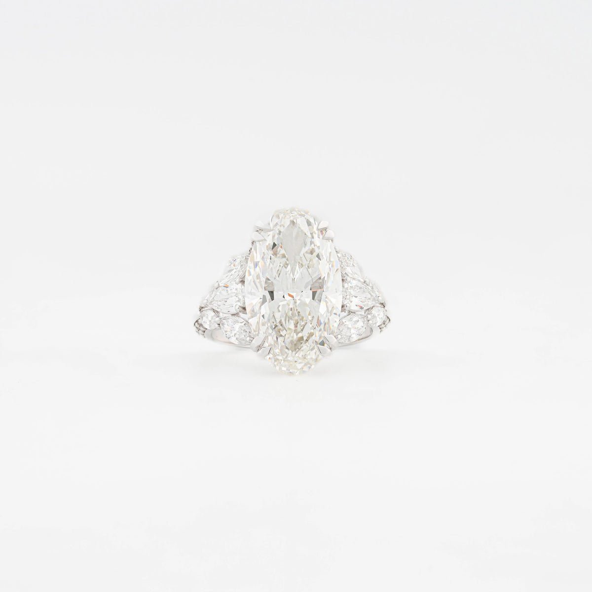 Serenade Pear Three-Stone Pavé Ring — front view