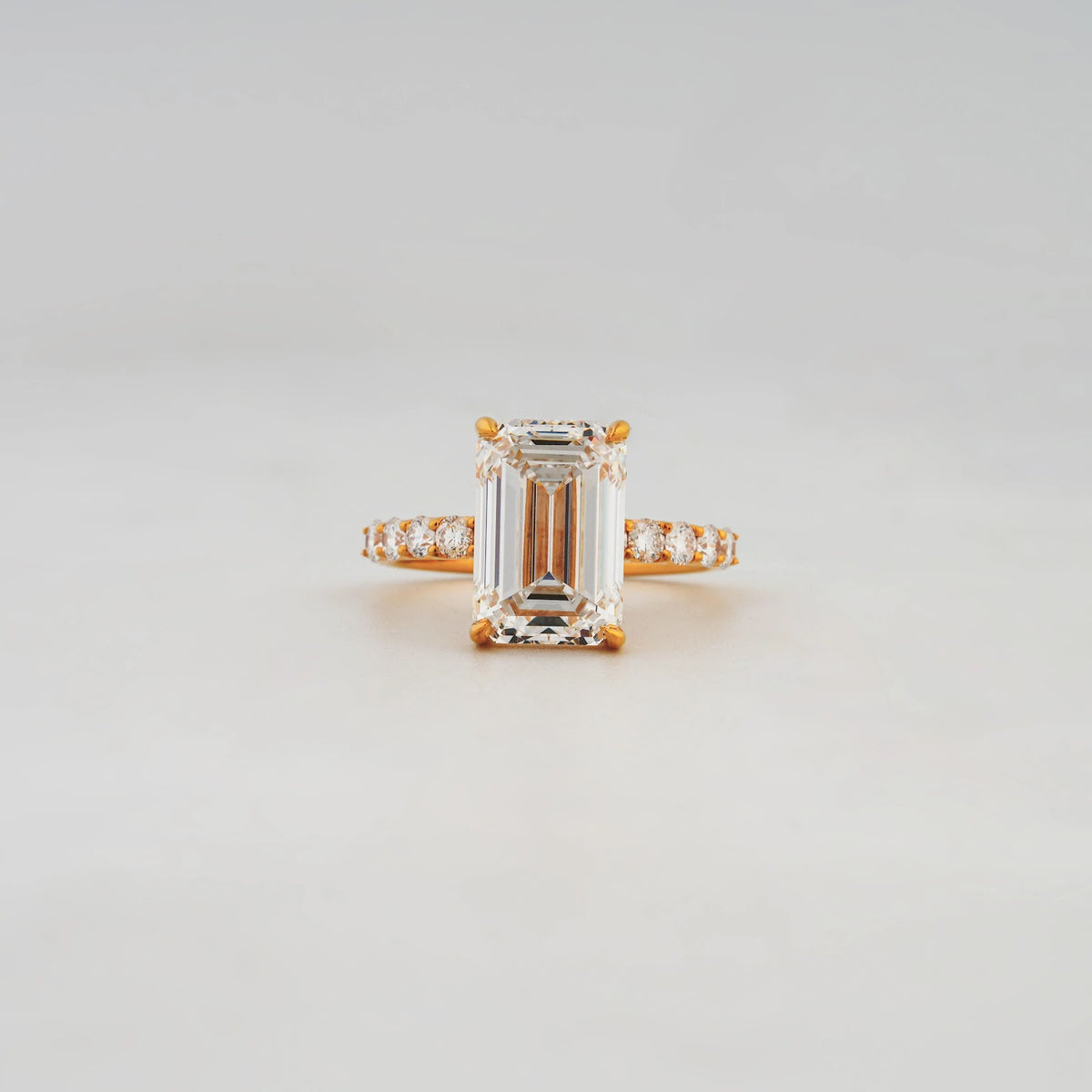 Arden Emerald-Cut Pavé Solitaire Ring — front view