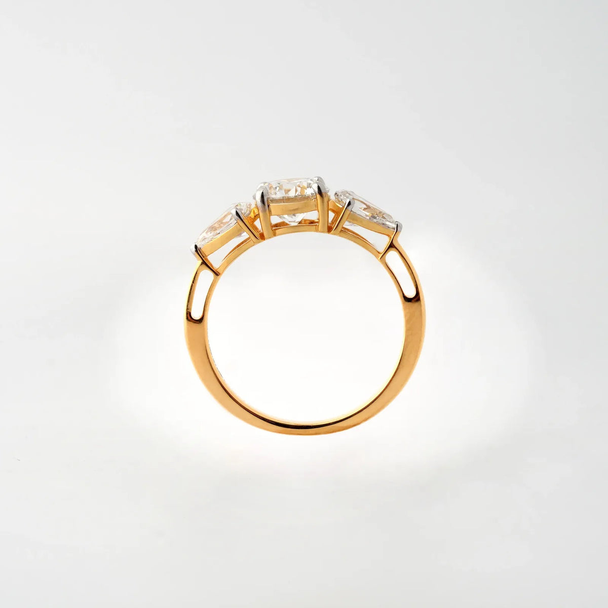 Round and Pear Three-Stone Diamond Ring - detail view