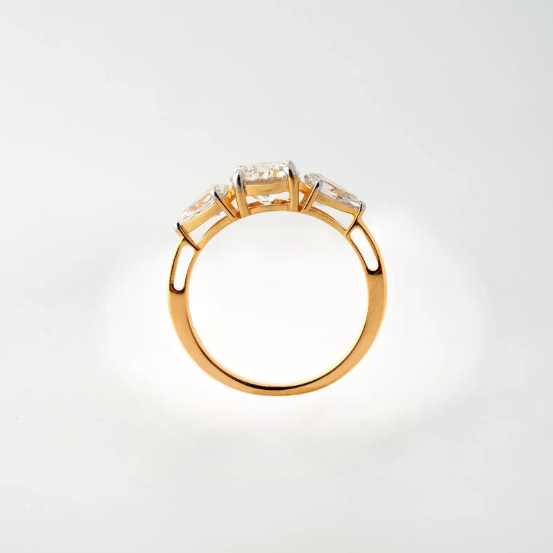 Round and Pear Three-Stone Diamond Ring - detail view