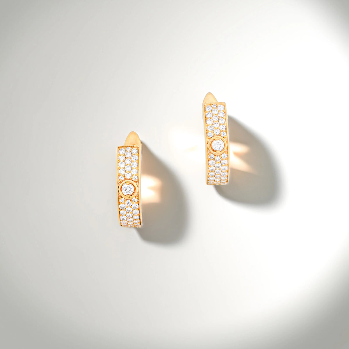 Orbit Bezel Accent Pavé Diamond Huggie Earrings